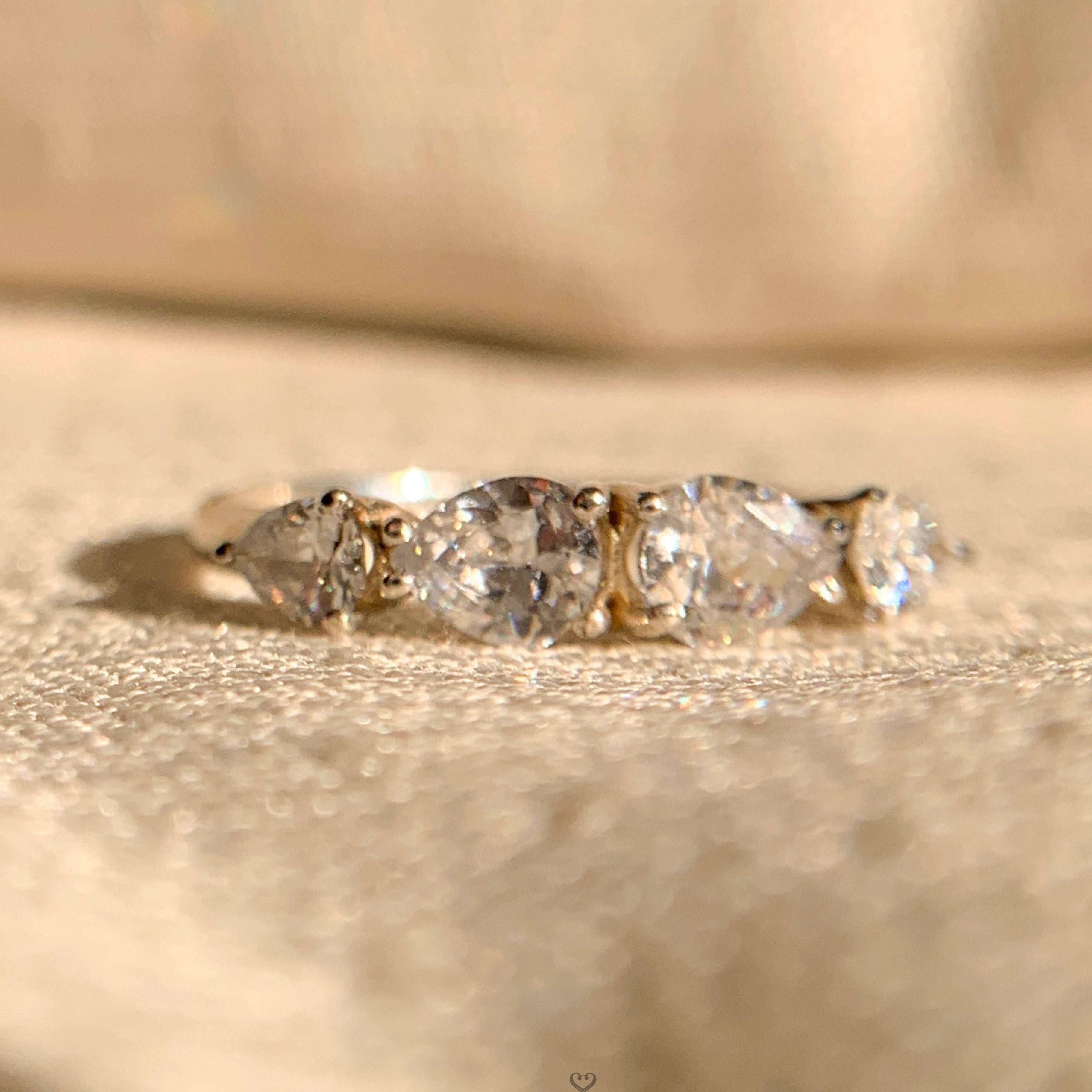 "Elegant 4 pear shaped diamond rings for sale in white gold"